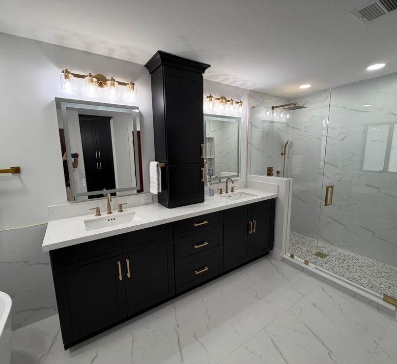 Matte black double vanity with center tower and glass shower
